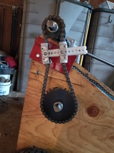 drive sprockets and chain on rock picker